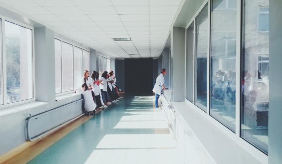 0001_woman-in-white-shirt-standing-near-glass-window-inside-room-127873_1575619108-14e88e0214a7c1bd911ae955e9bf089a.jpg